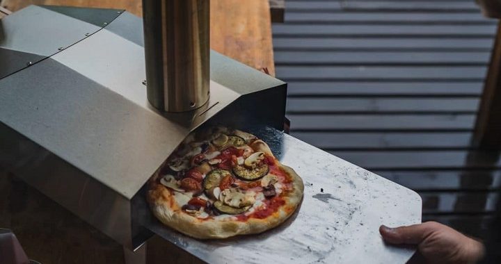 homemade pizza in pizza oven